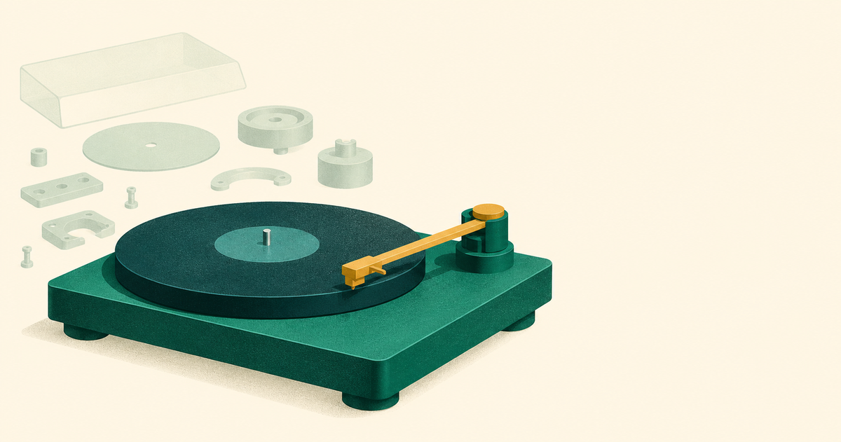 A simplified green turntable highlights one ochre tonearm beside unused components.
