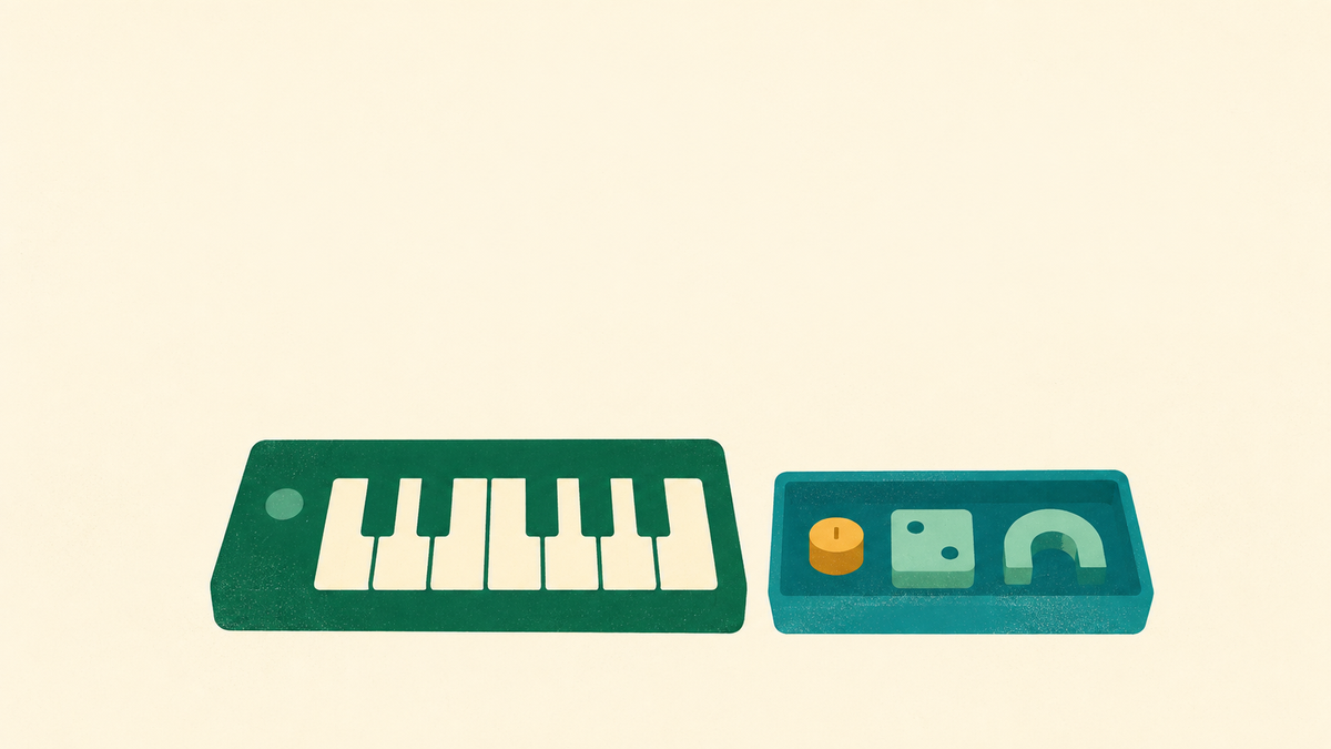 A simple keyboard beside a separate tray of optional controls and components
